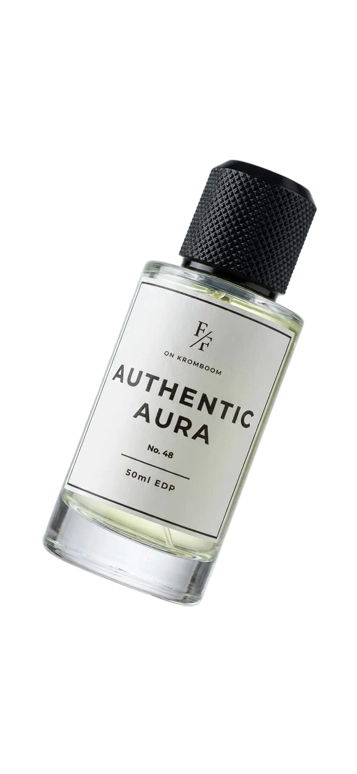 A 30ml bottle of F/K On Manhattan 'Authentic Aura' Eau de Parfum, featuring a clear glass bottle with a white label and a textured black cap, shown against a light gray background.