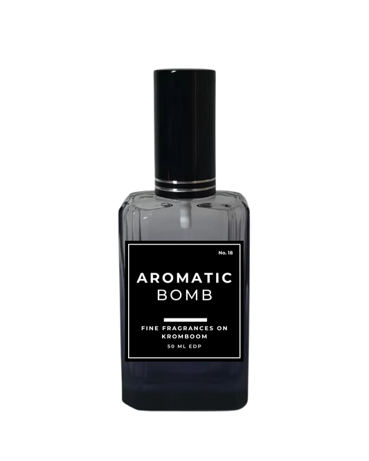 Perfume bottle labeled 'Aromatic Bomb' on a white background by Fine Fragrances on Kromboom