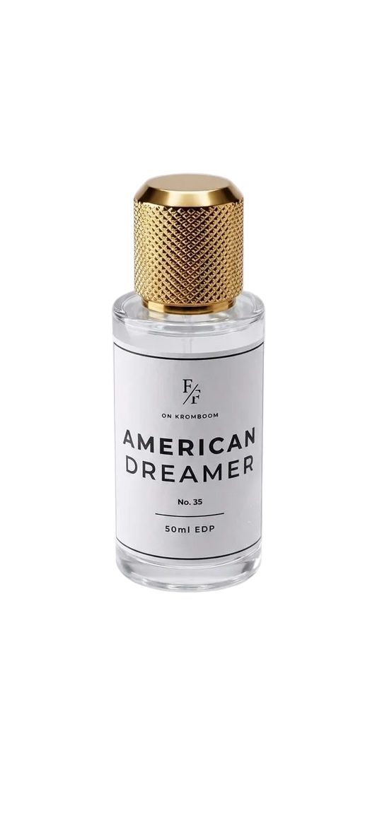 A 50ml EDT bottle of 'American Dreamer' by E&F Cosmetics, featuring a clear glass bottle with a textured gold cap and a white label.