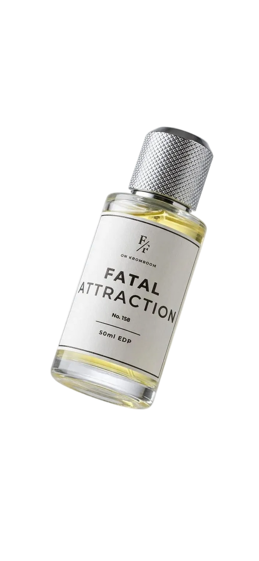 A clear glass bottle of Unearthed Fragrances 'Fatal Attraction' perfume with a textured silver cap, floating at an angle against a light gray gradient background with a soft reflection below.