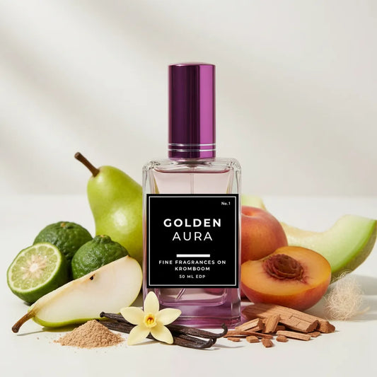 Perfume bottle labeled 'Golden Aura' with fruits and spices on a light background
