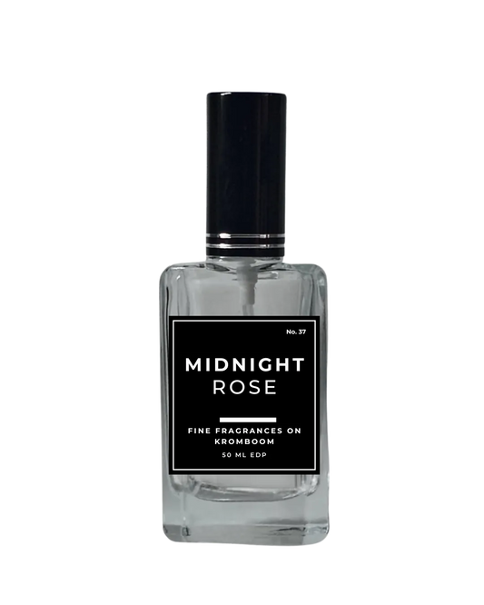 Perfume bottle labeled 'Midnight Rose' on a white background by Fine Fragrances on Kromboom