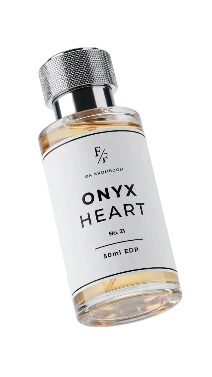 Perfume bottle labeled 'Onyx Heart' by Fine Fragrances on Kromboom on a white background