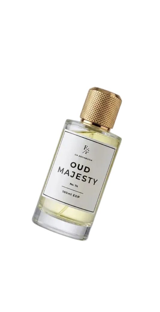 Bottle of 'Oud Majesty' perfume with gold cap on a white background