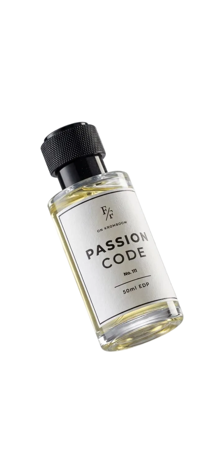 A 10ml clear glass bottle of passion code essential oil by On The Rocks, featuring a white label and a black ribbed cap, floating against a light gray gradient background.