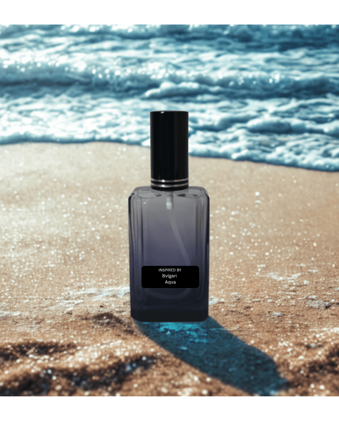 Aquatic fresh men’s perfume bottle – inspired by Bvlgari Aqva by Fine Fragrances on Kromboom on a sandy beach with ocean waves in the background