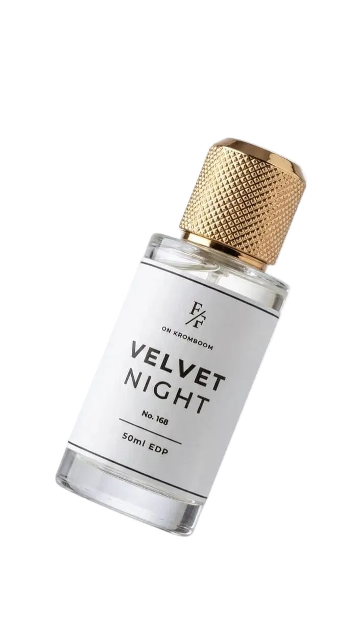 Perfume bottle labeled 'Velvet Night' with gold cap on a white background