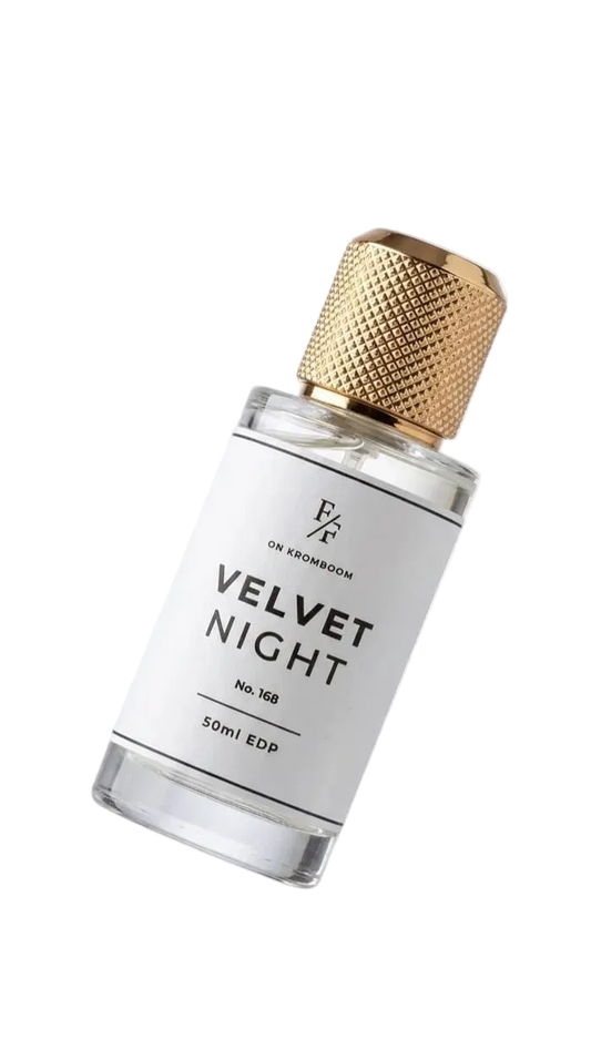 Perfume bottle labeled 'Velvet Night' with gold cap on a white background